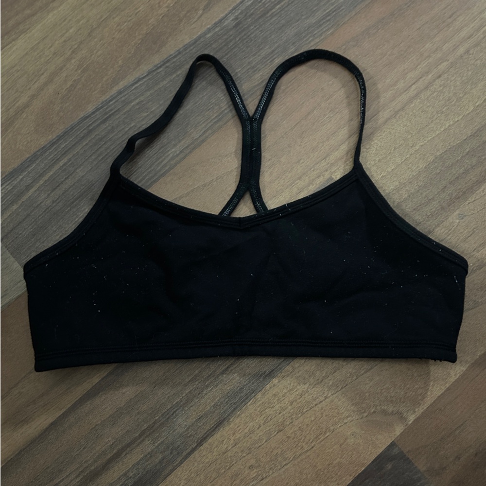 Two Ivivva sports bras